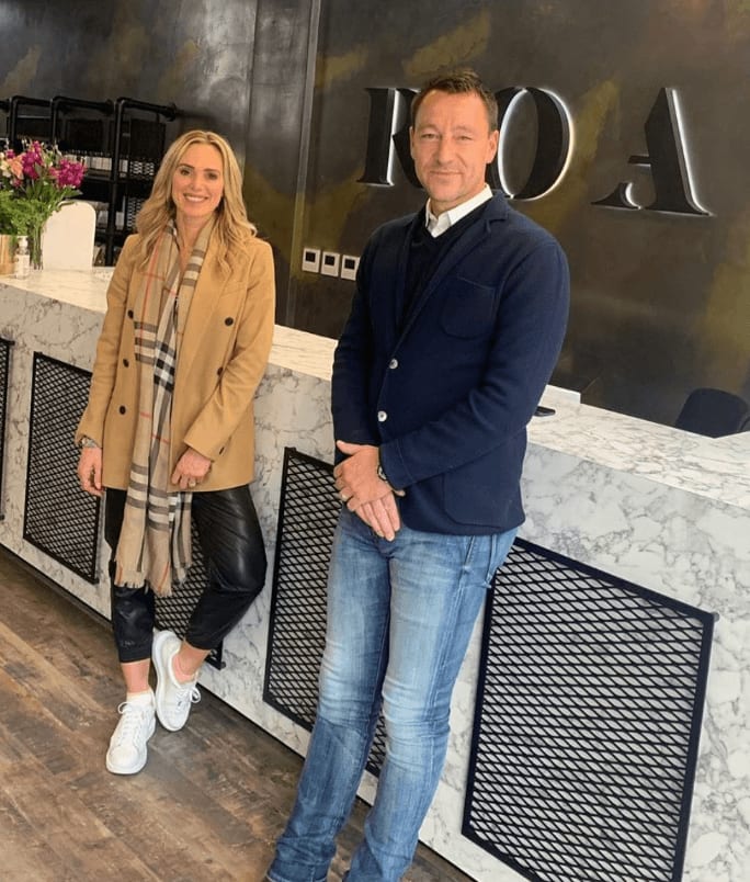 John Terry standing at the reception desk of ROAR Fitness London